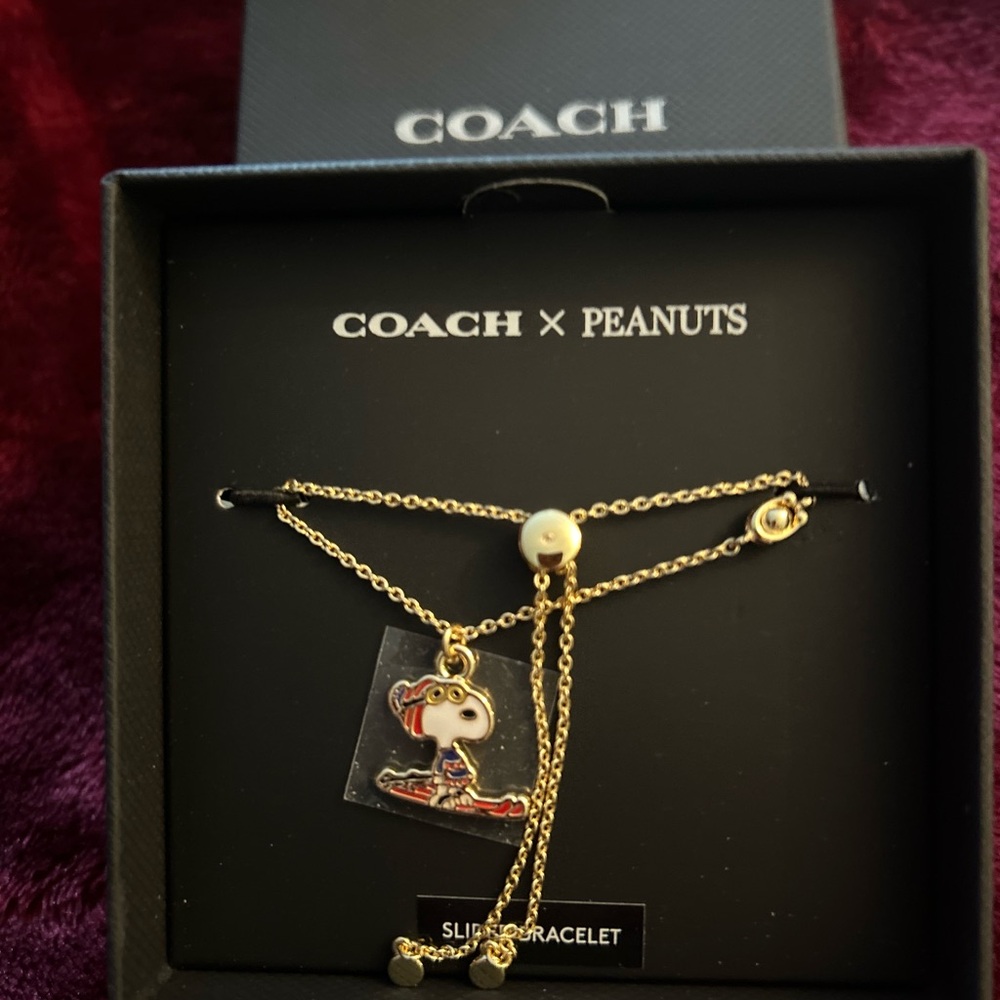 Limited Edition !! New in original box Coach  Slider Snoopy Bracelet..